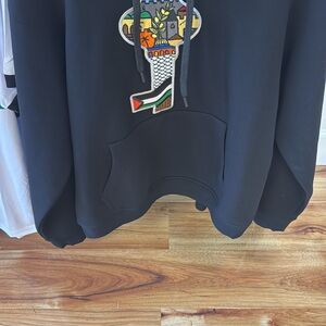 Black Sweatshirt with Colorful Patch